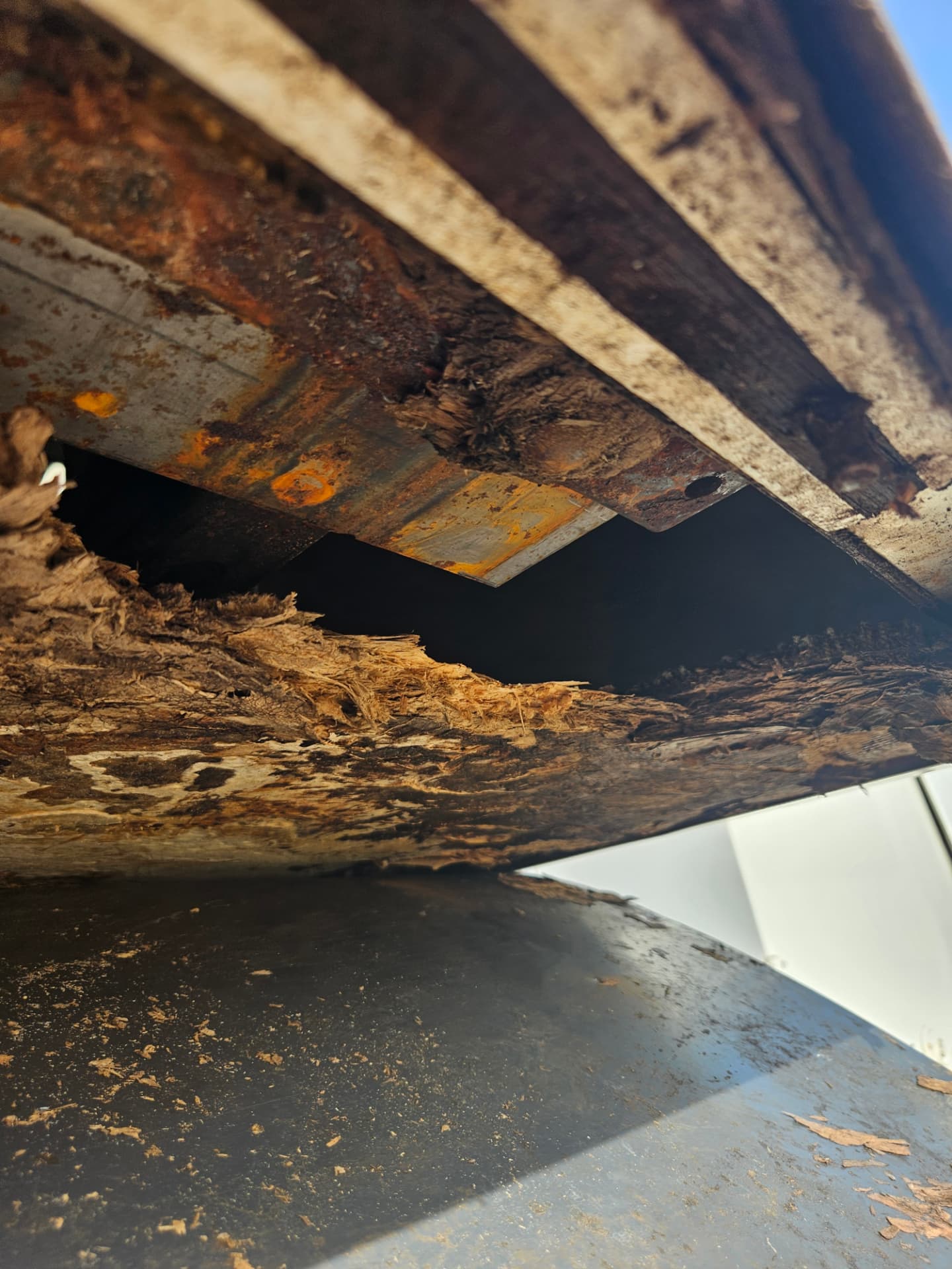Damaged RV slide-out floor with rotted decking