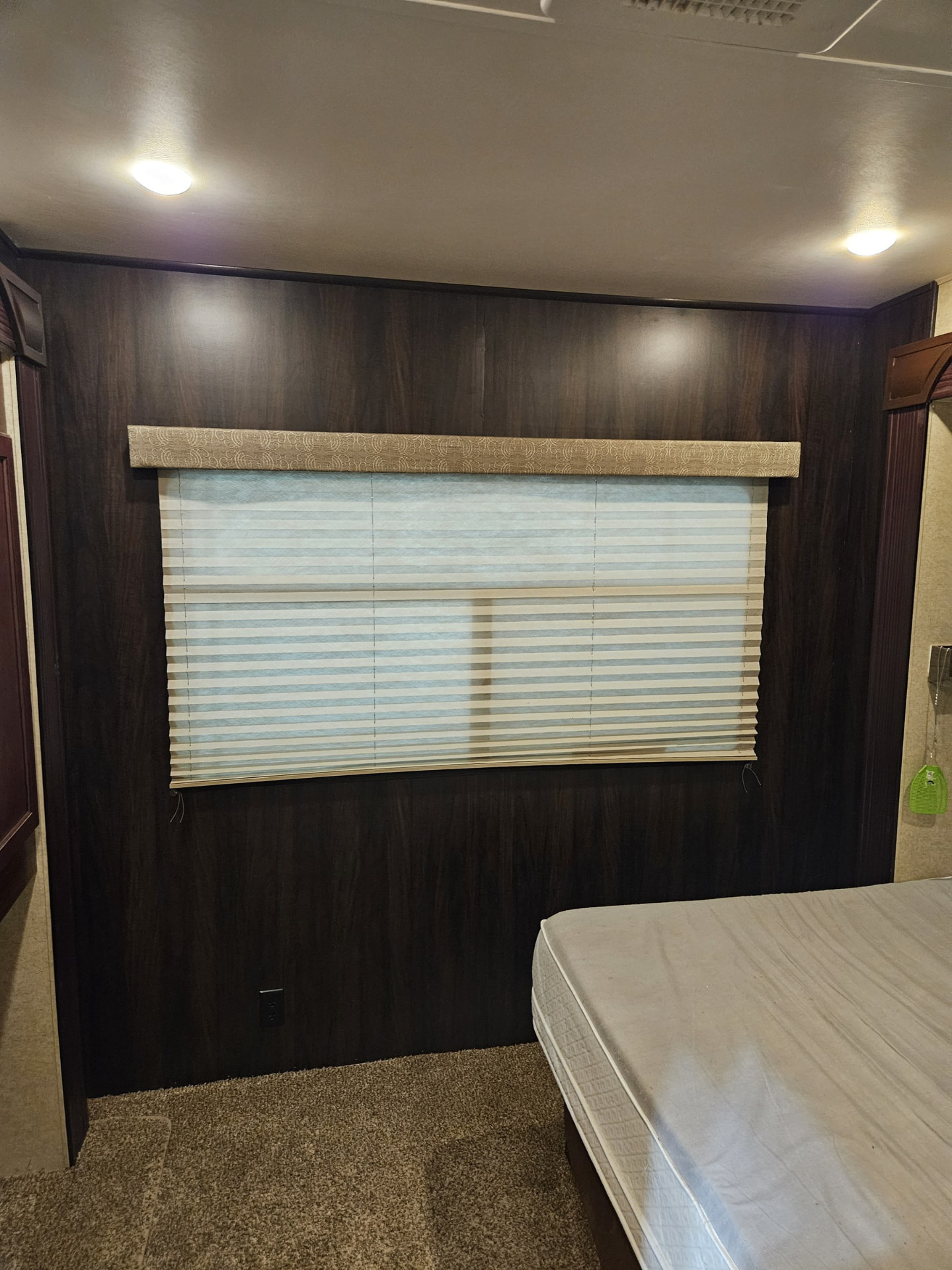 RV bedroom wall rebuilt and finished by Camper Care