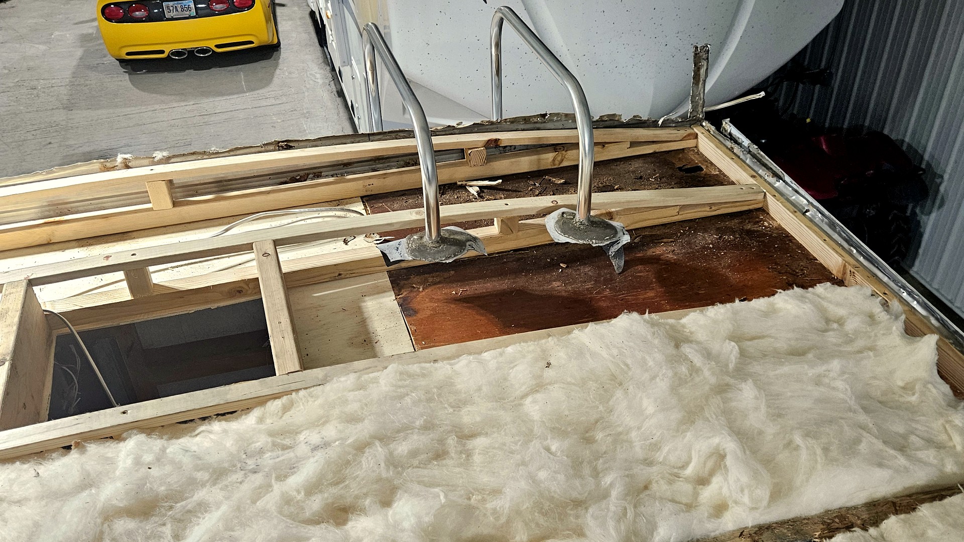 New decking installed over the rebuilt camper roof frame