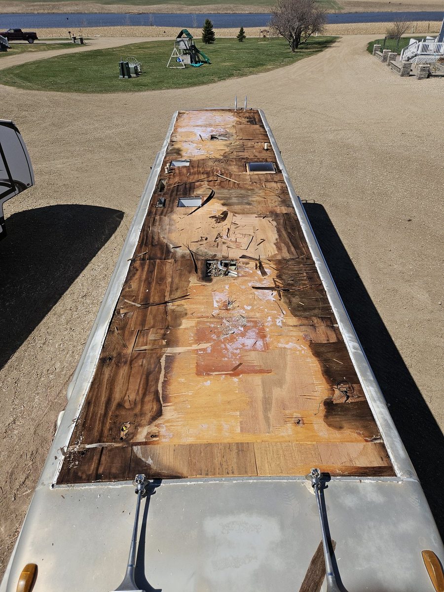 Camper roof stripped to bare decking during a full roof rebuild