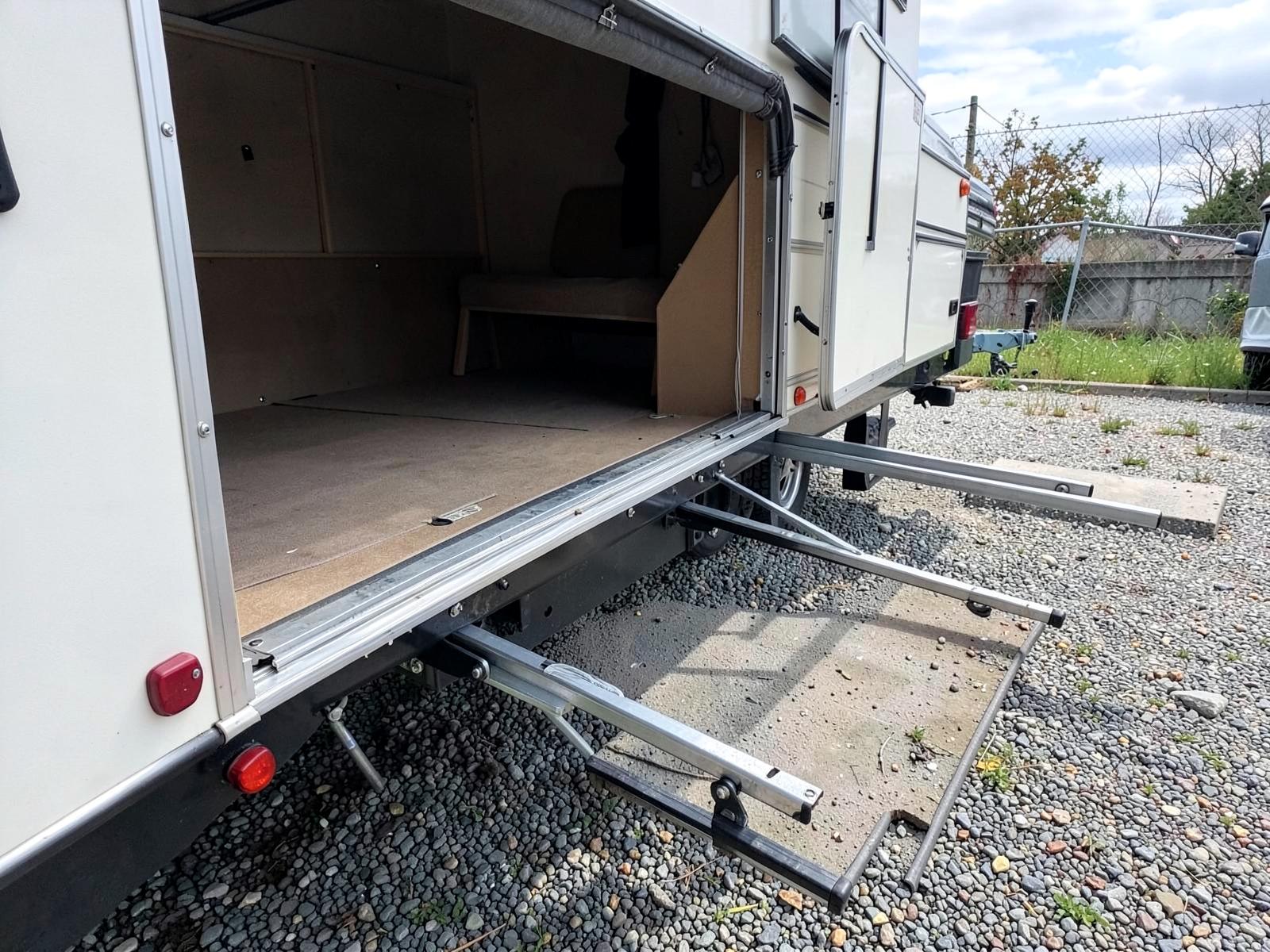 RV slide-out extended showing worn seal and wiper