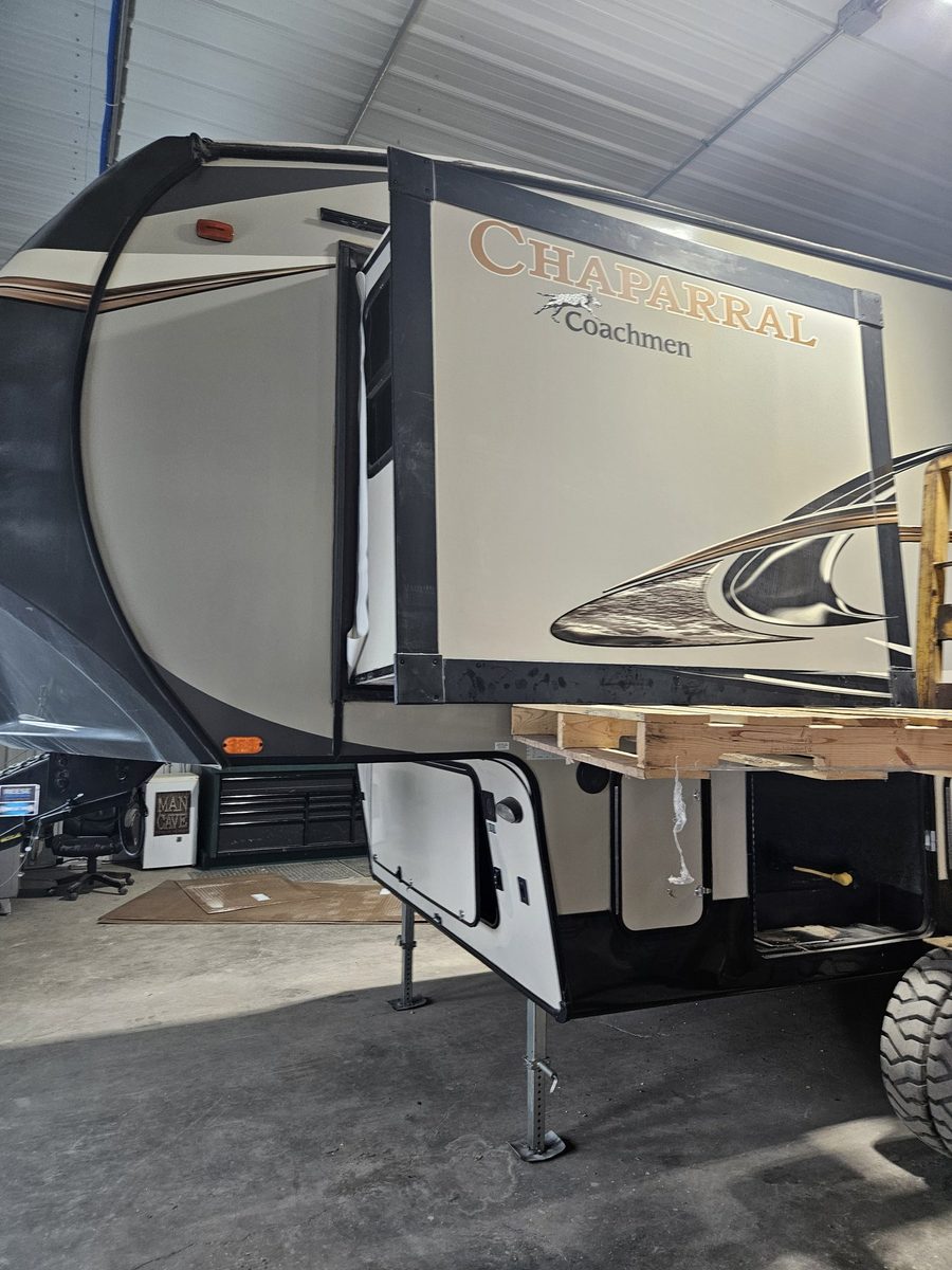 Camper rebuilt slide-out wall finished inside the Camper Care shop bay in Roscoe, South Dakota